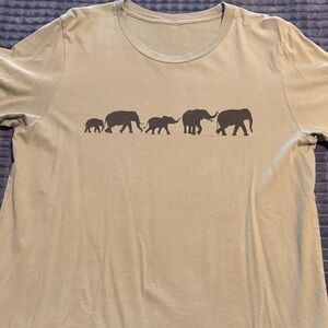 Green t-shirt with cute elephant graphic